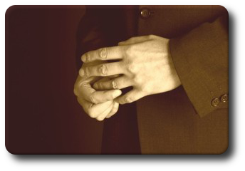 Person holding hands in distress due to suspected partner infidelity